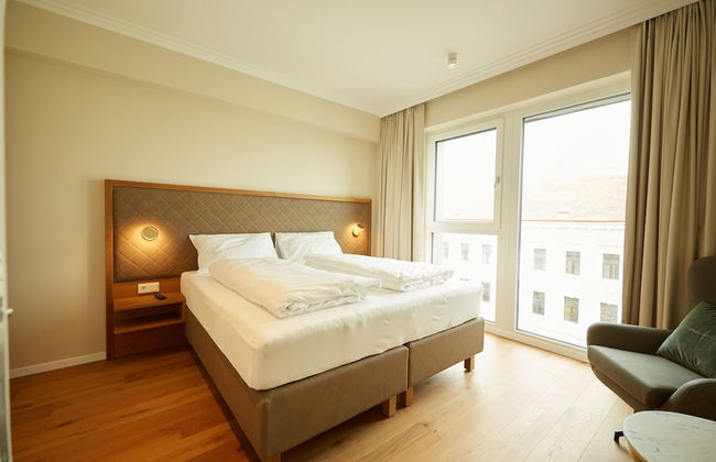 Green Leisure Apartments - Photo 1