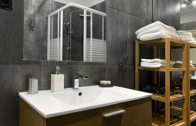 Prime Apartments White and Yellow - Photo 25