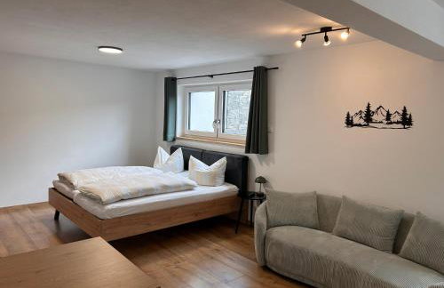 Apartment im Souterrain mit Terrasse - Foto 3