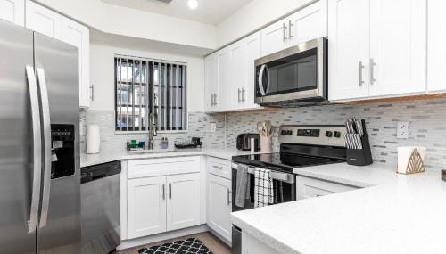 Bright open Townhome Delray Beach - Photo 5, stove, dishwasher