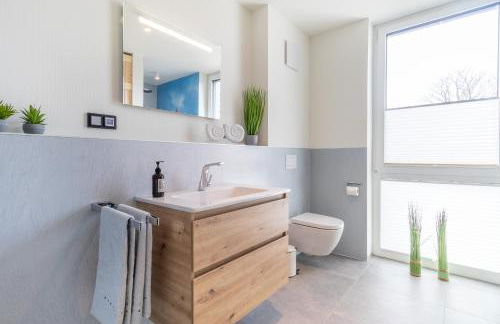 BeltBlick 24 – Moderne Ferienwohnung mit Dachterrasse und Meerblick! - Foto 21