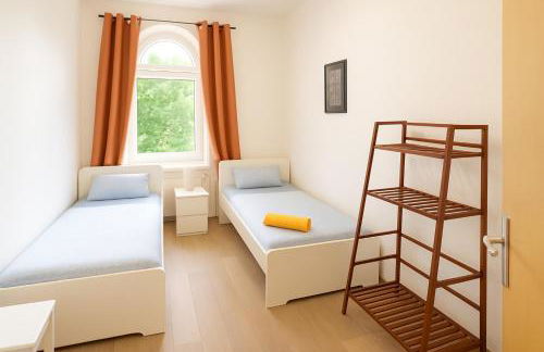 Monteurszimmer Move-in2Stay - Einzelbetten, Smart TV, Wifi - Foto 13