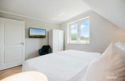 Lütt Diekje - Luxus-Haus mit Meerblick, Sauna & Kamin - Photo 14