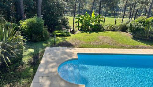 Villa Luxe piscine chauffée, 4 chambres, surplombant le golf entre océan & lac Plage à 5 min - Foto 5, Garden, Garden view