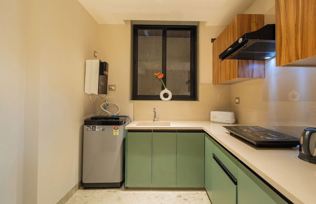 ELIVAAS Kamerios Verano 1 BHK with Pool - Photo 16