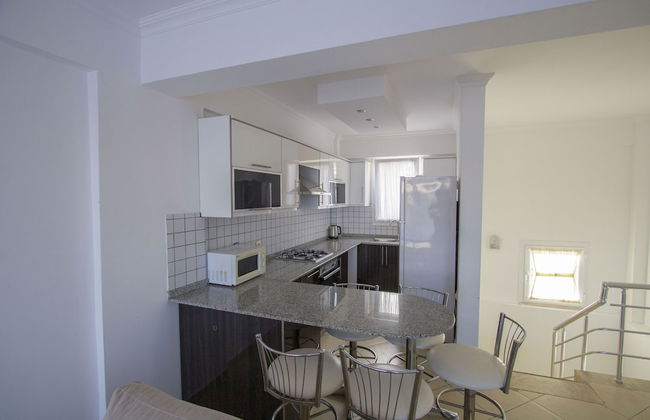 Infinity Olympia Apartments - Photo 18