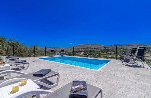 Elysian Stone Villa with Pool & Mountain View - Photo 3