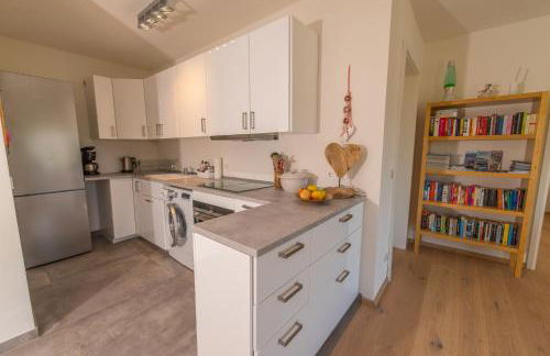 Helle Wohnung mit Bergblick & eigener Terrasse - Foto 12