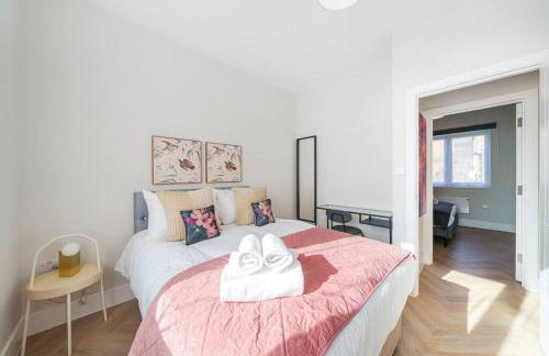 Cosy Tooting Retreat: 2-Bed Gem - Photo 2