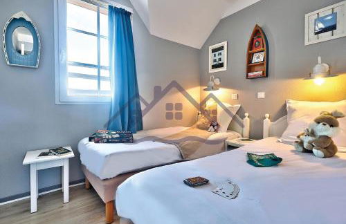 LocaLise - Maison E2 au Guilvinec - A 20m de la mer avec jardin et piscine - Tout à pied, plage, port, centre commerces, marché - Wifi inclus - Vue mer de la chambre - Animaux bienvenus - Linge de lit inclus - Foto 21