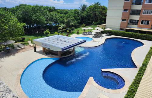 GUARAJUBA PARAÍSO DAS ÁGUAS - APT 2 quartos com AR e TV em TODOS os cômodos - Incluso Roupa de CAMA e BANHO - Filtro de Água Gelada e Maquina de Lavar dentro do APT - TOTAL CONFORTO PARA VC E SUA FAMILIA - Cond A beira da Lagoa e perto da PRAIA - Foto 9