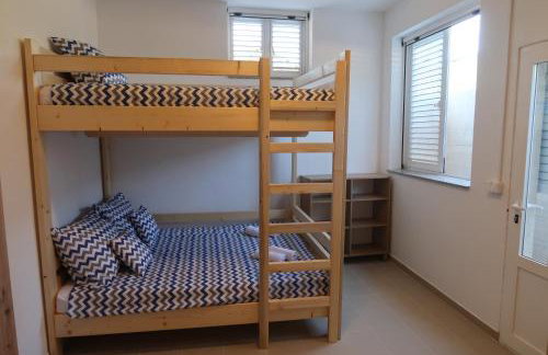 Robinson olive tree huts - Photo 29