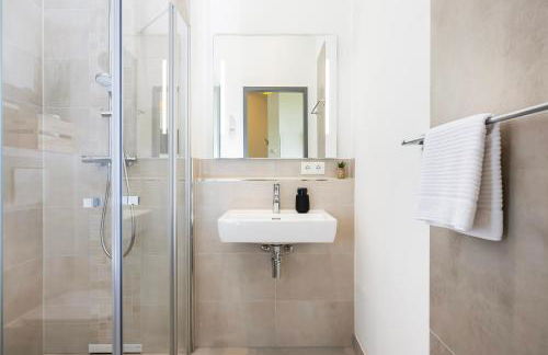 mayhome - das STRANDLOFT schönes Studioapartment mit Balkon, Küche und Tiefgarage - Sauna und Fitness direkt nebenan - Foto 18