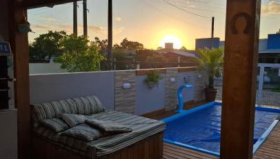 Casa aconchegante com piscina em Nova Tramandai, até 6 hospédes, não aceitamos pets - Foto 1