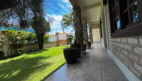 Casa espaçosa com sala de jogos interna e externa - Foto 5, Garden