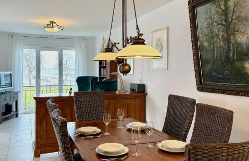 Ferienwohnung Residenz am See - exklusive Wohnung in erster Reihe mit Balkon und Seeblick - Photo 7