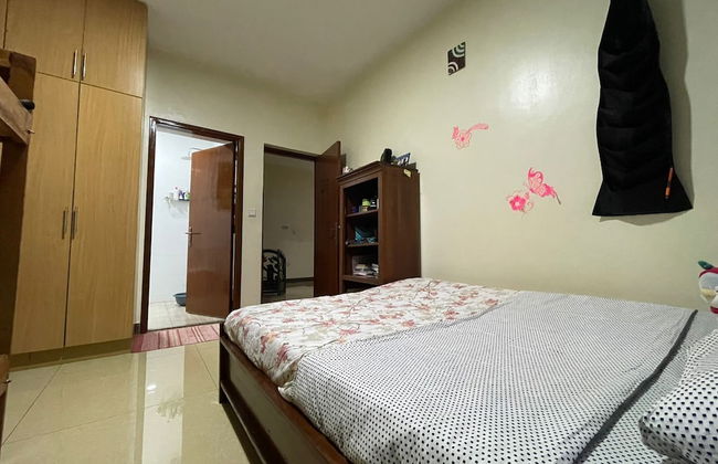 The Mugabi's Spacious Private Room - Foto 5