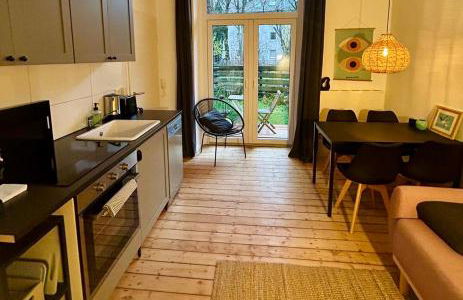 FeelsLikeHome - Stylische und zentrale Altbauwohnung mit Terrasse&Garten - Foto 2