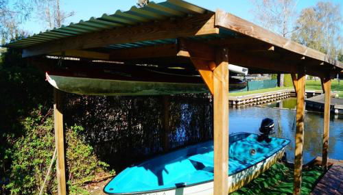 Ferienhäuschen direkt am Wasser inklusive 2 Boote - Foto 5, Garden