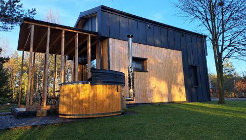 Domki przy jeziorze z prywatną plażą w Borach Tucholskich Pensjonat Alicja wczasy z dziećmi nowe luksusowe domki na skraju jeziora i lasu - Foto 3