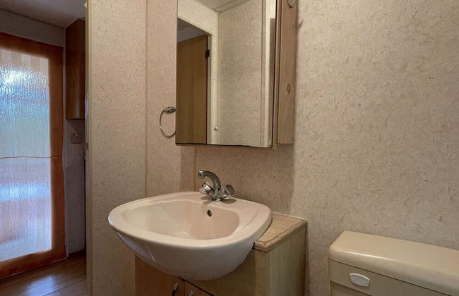 Pleasant Mobile Home in Toscana With Shared Pool - Photo 14