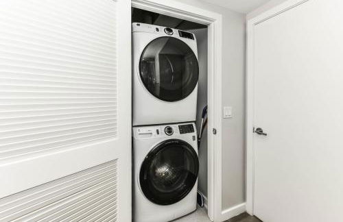 Comfy 2BR Oasis with Scenic Rooftop & Gym - Photo 47