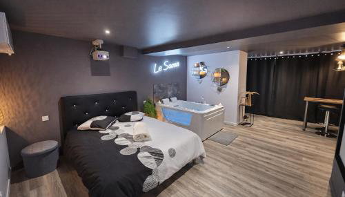 Suite de luxe Balnéo et Cinéma Le Saona - Foto 4