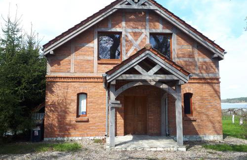 Dom nad jeziorem z linią brzegową - Foto 4