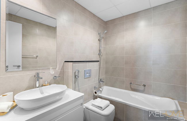 WelHome - Breathtaking 1BR Apt with Balcony and City View - Photo 16