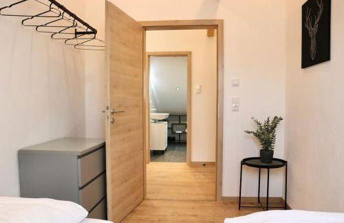 Moderne DG-Wohnung im Günztal - Foto 13