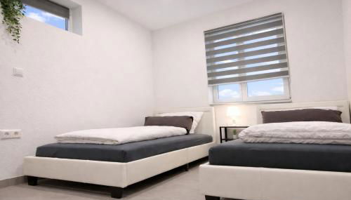 STN Apartment Suite - Ferienwohnung mit 2 Schlafzimmer & Parkplatz, Highspeed WLAN, Fußbodenheizung & Netflix Premium, Zentral zu Audi & Schwarz Gruppe - Foto 3