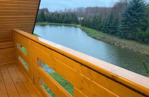 Domek drewniany nad stawem - Foto 3