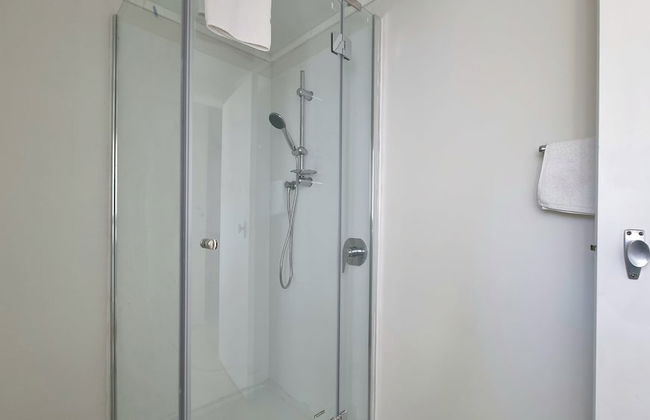 Lovely 2- Bedroom Unit with Free Parking - Photo 17