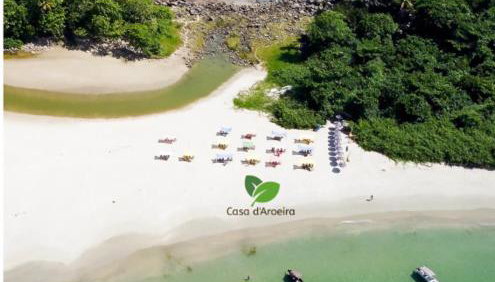 Casa d'Aroeira Residencial Boutique - Centro de Juqueí - Perto de Tudo - 2 quadras do Mar - Serviço de Praia - Roupa de Cama 600 fios algodão Egípcio - Tudo Novo - Estacionamento Interno - Cozinha - Consulte unidades com Ofurô Hidro e Cromoterapia - Foto 3