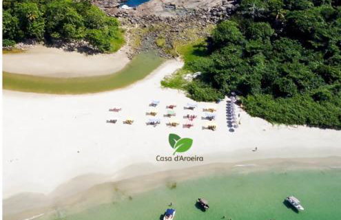 Casa d'Aroeira Residencial Boutique - Centro de Juqueí - Perto de Tudo - 2 quadras do Mar - Serviço de Praia - Roupa de Cama 600 fios algodão Egípcio - Tudo Novo - Estacionamento Interno - Cozinha - Consulte unidades com Ofurô Hidro e Cromoterapia - Foto 6