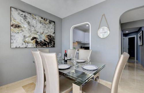 Stylish Penthouse Duplex at Matchroom Country Club - Photo 9