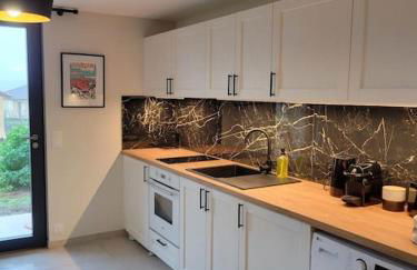 Studio en rez-de-jardin - Photo 11