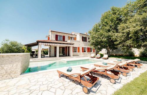 Villa Alma mit privatem Saltwater Pool - Photo 1