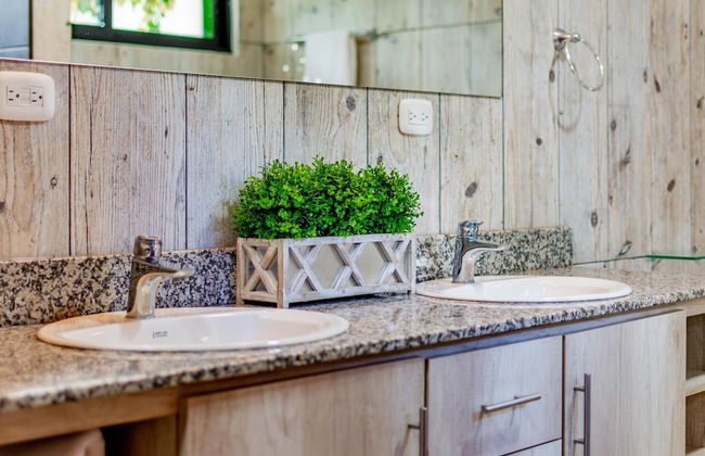 Ultramodern Townhome with an Inviting Coastal Design and Lush Outdoor Oasis with a Private Pool - Photo 21