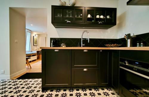 Montmartre en rez-de-jardin - Foto 11