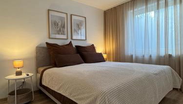 Modernes 2-Zi Apartment mit Terrasse und Garten - Foto 3