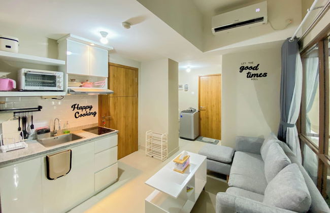 Homey and Nice 1BR at LRT City Jatibening Apartment - Photo 12