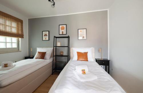 C4S -COME4STAY -InnHarmony- Stilvoll eingerichtetes Apartment für bis zu 8 Personen - Hochwertige Betten I voll ausgestattete Küche I Balkon I Badezimmer I WLAN I Smart TV - Foto 1