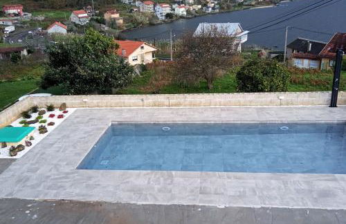 Casa nueva con piscina y vistas al mar - Foto 12