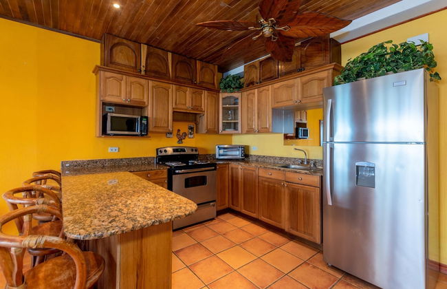 Beachfront Condo with Warm, Rustic Interiors & Direct Access to Playa Flamingo - Photo 8