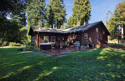 Tree-lined Home with Hot Tub Firepit & Large Yard - Photo 1