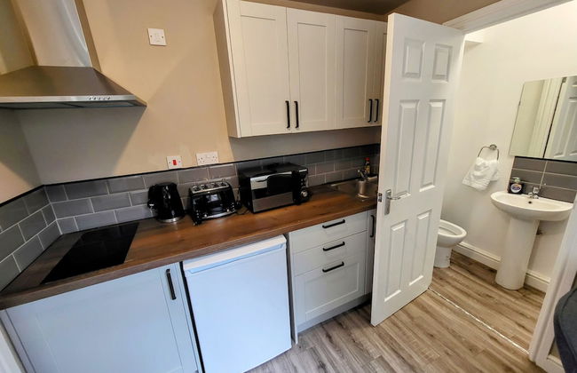 Comfortable Stay - LB Ave - Photo 16