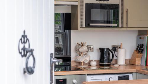 A D Coach House Cottage - Foto 2