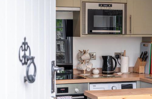 A D Coach House Cottage - Foto 2