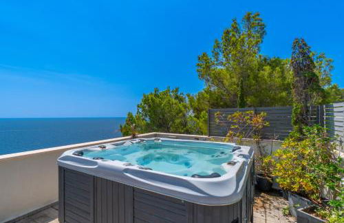 Can Ema, villa moderna con piscina frente al mar - Photo 36